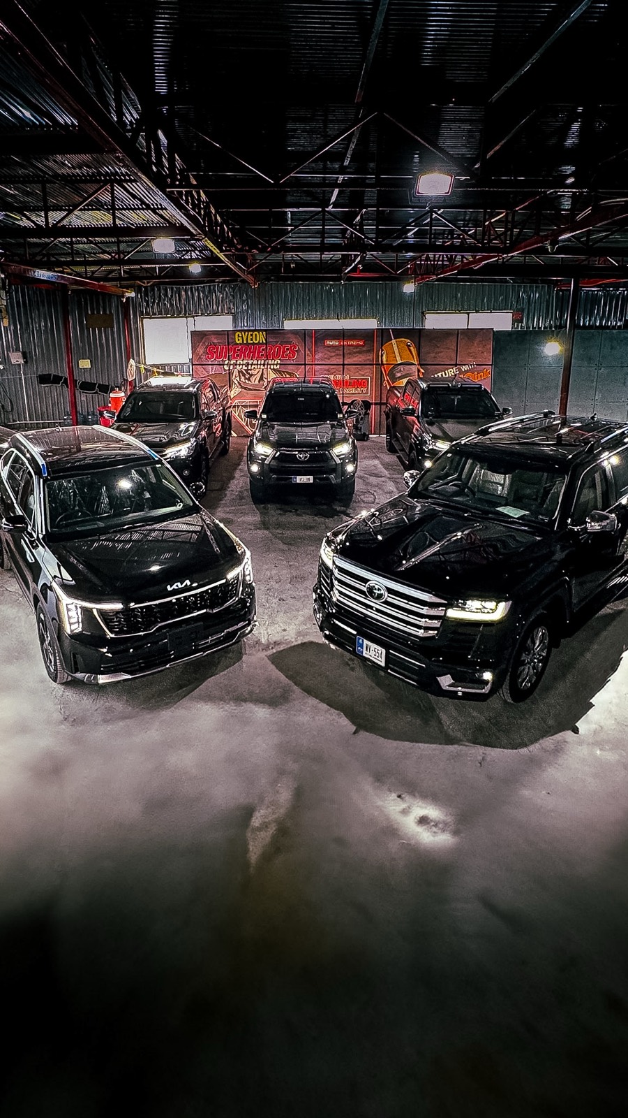 Inside the Auto Extreme studio — news work under inspection lighting.